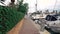 FURNARI, SICILY, ITALY - SEPT, 2019: Tiled walkway at pier with moored sailing yachts and runabouts