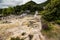 FURNAS, AZORES - Juny, 2018: Geothermal cooking in Fumarolas da Lagoa das Furnas on Sao Miguel island, Azores.