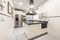 Furnished kitchen with central island with extractor hood, polished black granite countertops and integrated stainless steel