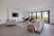 Furnished luxury modern sitting room with bifold doors