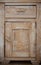 Furniture part. Closeup of wooden kitchen cabinet