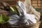 Furoshiki technique. Gifts packed in different fabrics and flowers in bowl, closeup