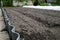 Furrows in a prepared almost empty vegetable garden in springtime. Vitamins healthy biological homegrown organic