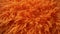 Furry Shaggy piece of a pillow cover in bright orange color