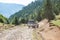 Fushe Lure, Albania - July 25, 2019. Vintage off road car going on dirt road in National park Lure, Albania