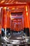 Fushimi Inari-taisha Shrine. Thousands countless vermilion Torii gates on a hill