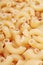 Fusilli dry pasta background concept. Pasta texture for background uses. Swirled pasta pattern. Food photography in