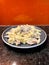 fusilli pasta with white cream sauce vertical