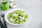 Fusilli pesto pasta with pine nuts, basil leaves and parmesan cheese