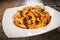 Fusion cuisine - italian pasta and greek beans