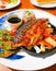 Fusion japanese food-mackerel fish steak soy sauce, Grilled fish with white sesame seed topping and vegetables side dish