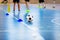 Futsal soccer training field. Young sports players with balls on training