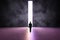 Future concept with black man silhouette heading on glossy purple shades concrete floor to white glowing door hole in dark wall.