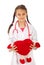 Future doctor girl holding heart toy