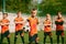 Future football champions. Little boys, kids in sports uniform posing with ball at soccer school stadium. Concept of