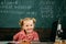 Future student answer at chalkboard. Little girl learning for future examination