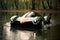 futuristic amphibious car entering water