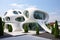 Futuristic architecture, sustainable building design, painted in white