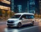 Futuristic electric cargo delivery minivan truck driving on city highway with full autonomous driving system parked at