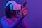 Futuristic female touching virtual screen