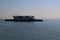 Futuristic ferry boat crossing a lake on a hazy day