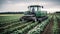 Futuristic harvesting machines in a vegetable field. Concept of agriculture in the future.