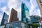 Futuristic high-rise commercial office buildings rise behind train station building on Potsdamer Platz