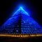 Futuristic pyramid glow blue.