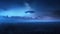 Futuristic UFO lands on a field during starry mysterious night above the forest and many clouds. Universe fantasy