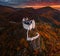 Fuzer, Hungary - Aerial view of the beautiful Castle of Fuzer with amazing colorful sunrise sky and clouds on an autumn morning