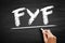 FYF Full Year Forecast - year-ahead prediction of various financial and logistic needs for a business, acronym text on blackboard