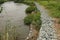 Gabion, cages filled with rocks used for erosion control