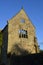 Gable end of a derelict building.