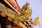 Gable End of Temple Roof, the saluting angle out of mouth of Naga, Wat Phra Sing - Chiang Rai, Thailand
