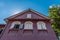 Gable roof, antique house with wooden windows