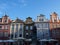 Gabled classical houses in Poznan Poland against the background of the blue sky