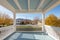 gabled roof of a greek revival porch on a sunny day