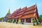 The gabled roof of Viharn Luang and Chedi of Wat Phra That Lampang Luang Temple, Lampang, Thailand