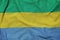 Gabon flag printed on a polyester nylon sportswear mesh fabric w