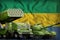 Gabon heavy military armored vehicles concept on the national flag background. 3d Illustration