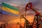 Gabon oil industry concept. Industrial illustration - Gabon flag and oil wells with the red and blue sunset or sunrise sky