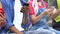 Gadget addicted multiethnic teen friends using smartphones instead of real talk