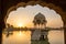 Gadi Sagar - artificial lake view through arch