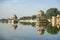 Gadi Sagar temple on Gadisar lake with reflection.