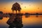 Gadisar Lake at Jaisalmer Rajasthan with ancient temple architecture at sunrise