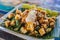 Gado-gado Indonesian salad served with peanut sauce. Ingredients: tofu, spinach, string beans, soy sprouts, potatoes