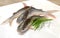 Gafftopsail Cat Fish Fish decorated with herbs and vegetables .Selective Focus