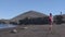 Galapagos cruise ship tourist walking on beach with animals, sea lions