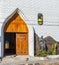 GALAPAGOS ISLAND, ISLA ISABELA - JULY 2, 2019: Large wooden door to the church