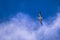 Galapagos Islands - August 24, 2017: Blue-footed Boobie flying over Plaza Sur island, Galapagos Islands, Ecuador